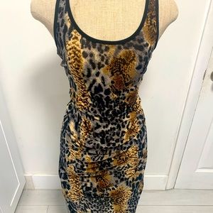 Maxi Dress - Beautiful Leopard print . Lightly stretchy material.